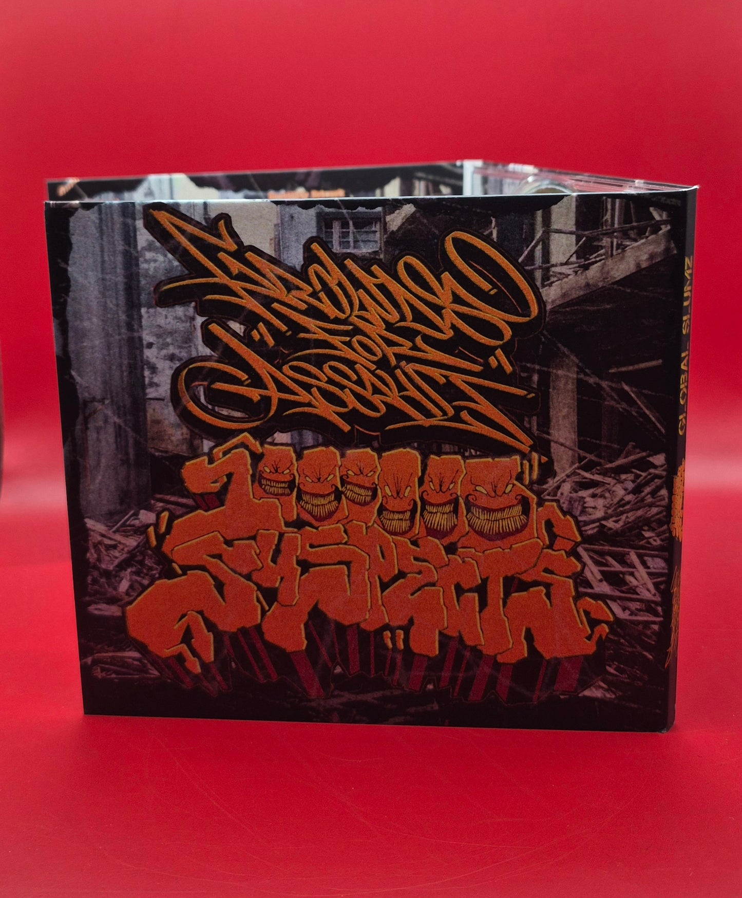 GROUNDS FOR ASSAULT / MILLION SUSPECTS - 'GLOBAL SLUMZ' SPLIT CD
