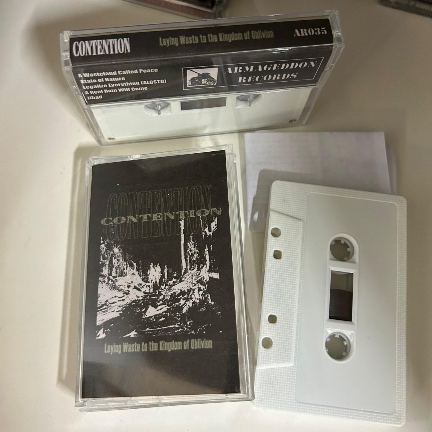 CONTENTION - "LAYING WASTE TO THE KINGDOM OF OBLIVION" CD - TAPE - VINYL [US IMPORT]