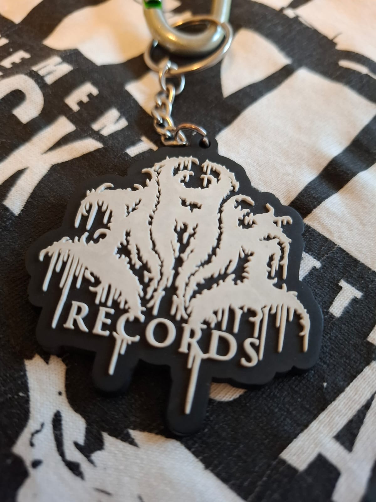 AAK RECORDS 2D EMBOSSED RUBBER KEYCHAIN